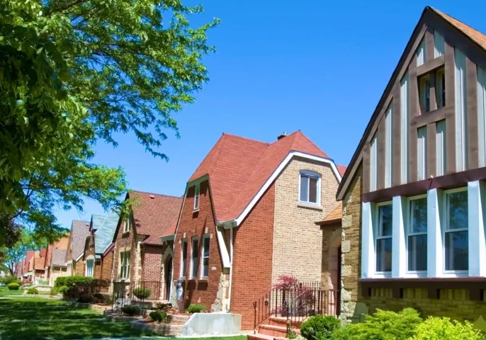 Suburban street with charming brick houses.